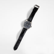 Todd Reed watch made with Stainless steel, sterling silver, and white brilliant cut diamonds (.24ct) on a leather strap